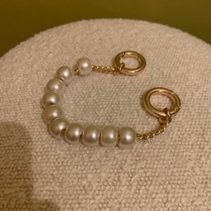 Pearl and thick gold chain bag handle